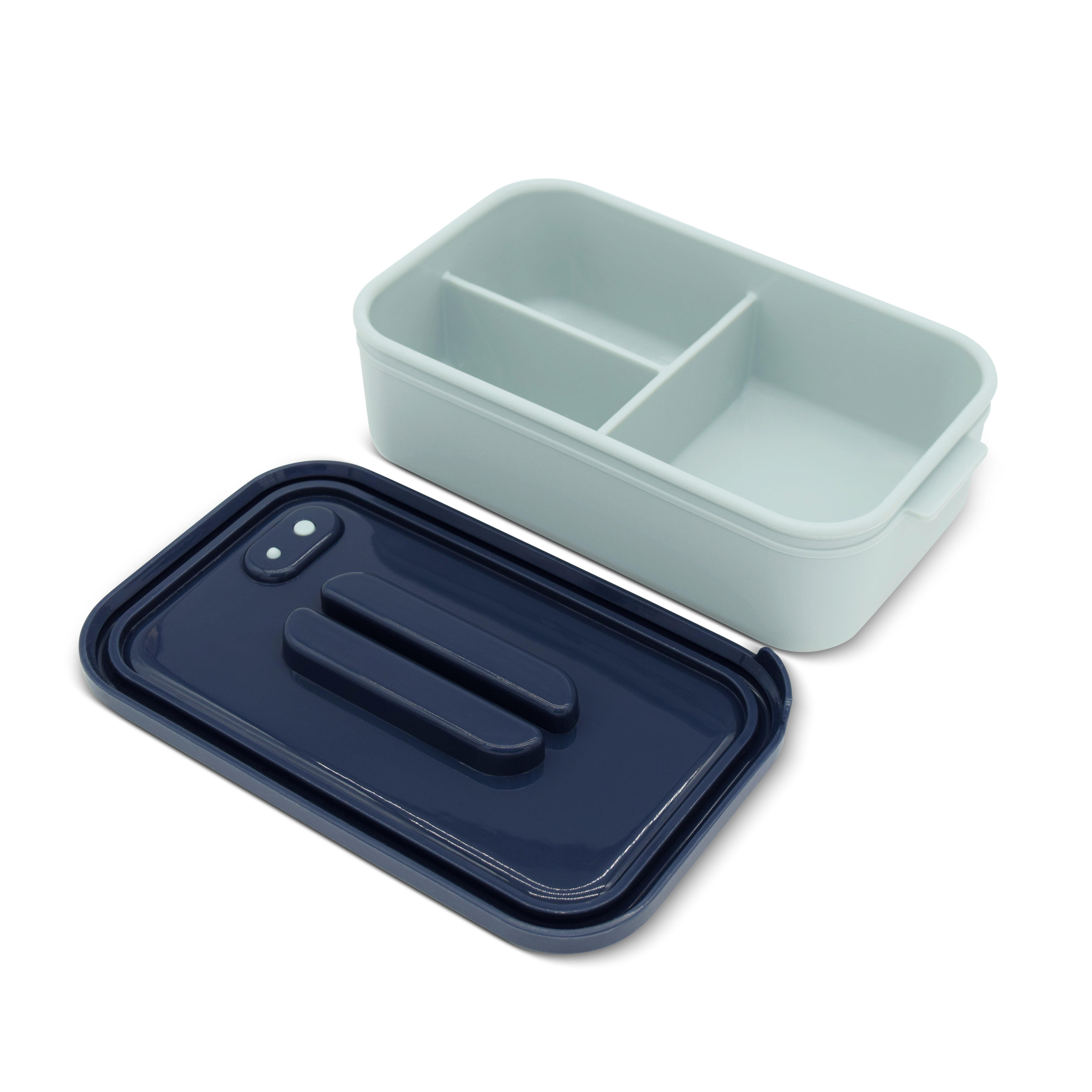 Blue lunch box with a divided compartment on a white background